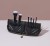 Set of seven INIKA Organic brushes in an elegant black case, with black handles and soft two-tone bristles.