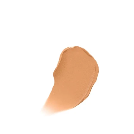 Swatch of Jane Iredale Enlighten Concealer as a blended creamy drop in a warm beige-peach shade.