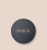 Round container with a matte black lid and gold INIKA lettering, shown on a light beige background.