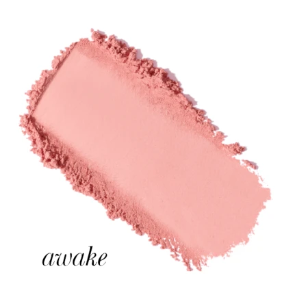 Awake shade swatch of Jane Iredale PurePressed Blush in a cool medium pink.