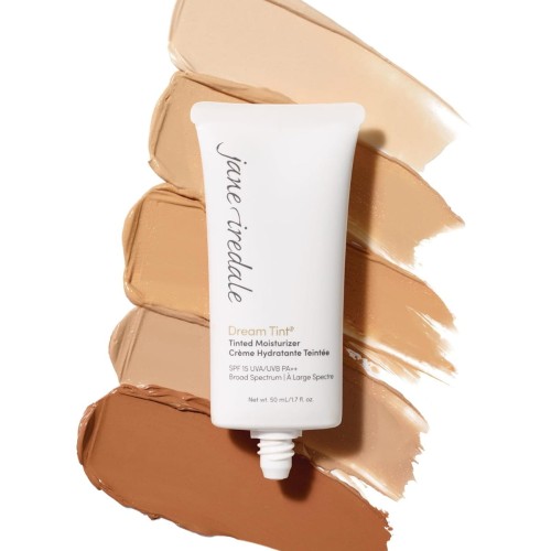 Jane Iredale Dream Tint Tinted Moisturizer tube on a background of different shade tones.