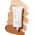 Jane Iredale Dream Tint Tinted Moisturizer tube on a background of different shade tones.