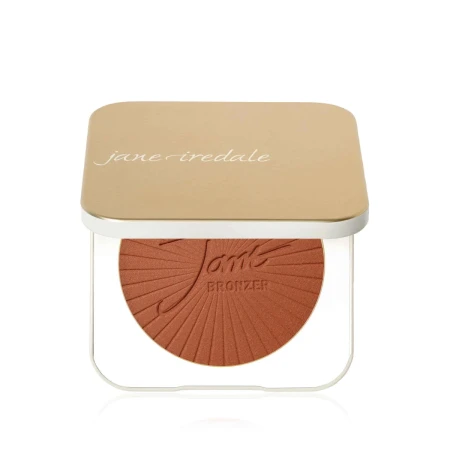 Gold and white Jane Iredale refillable compact with a minimalist design, front text “you make the world more beautiful” and powder inside.