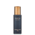 INIKA Organic Radiant Glow Veil in an elegant dark matte glass bottle with a metallic gold cap.