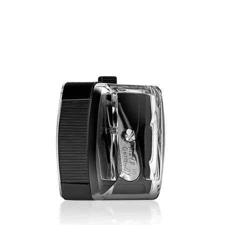 Black makeup pencil sharpener with transparent cover and visible blade.