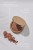 Graphic showing INIKA Organic baked bronzer and key active ingredients: magnolia bark extract, squalane and sugar cane.
