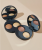 Two open INIKA Organic Baked Contour Duo compacts in different shades, each with a darker contour shade and lighter highlighter.