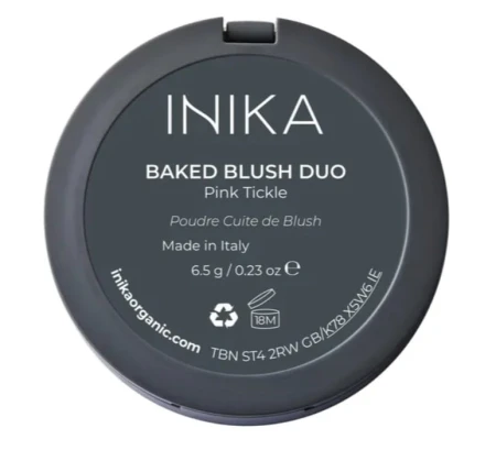 Closed black INIKA Baked Blush Duo PINK TICKLE compact with product label.