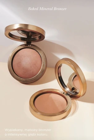 Two INIKA Organic Baked Mineral Bronzer shades in elegant gold compacts with mirrors.