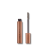 INIKA Organic Bold Lash Mascara in metallic copper-gold packaging with the applicator brush exposed.