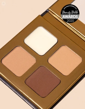 Open INIKA Organic brow palette showing matte brow powders and wax in a compact case.