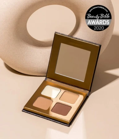 Open INIKA Organic Brow Palette with mirror and brow shades for daytime touch-ups.
