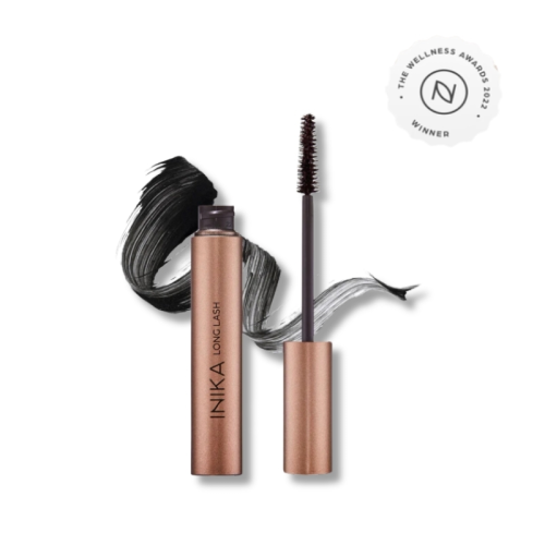 INIKA Organic Long Lash Mascara in copper packaging with brush and black mascara swipe.