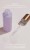 Open bottle of INIKA Organic Bakuchiol Serum with a dropper and a visible drop of serum.