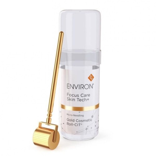 Environ Cosmetic Gold Roll-CIT gold derma roller leaning against clear packaging with Focus Care Skin Tech+ label.