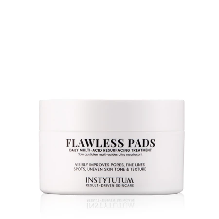 White INSTYTUTUM Flawless Pads jar with minimalist black lettering for daily resurfacing care.