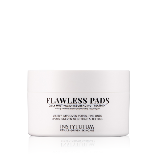 White INSTYTUTUM Flawless Pads jar with minimalist black lettering for daily resurfacing care.