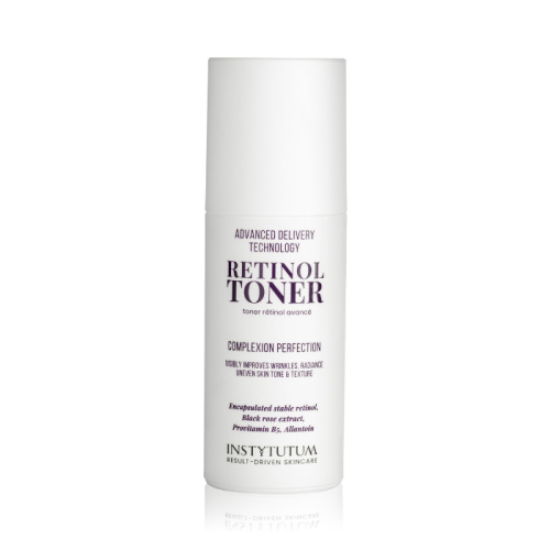 White INSTYTUTUM Retinol Toner bottle with purple and black lettering.