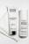 INSTYTUTUM Retinol Toner displayed with Transforming Melting Cleanser on a white towel.