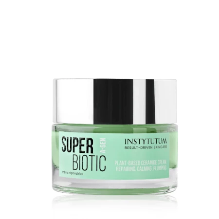 Light-green INSTYTUTUM SuperBiotic Regenerating Cream jar with silver lid and regenerating plant-ceramide formula.