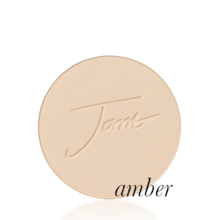 Amber shade of Jane Iredale PurePressed Base refill in a light warm beige tone.