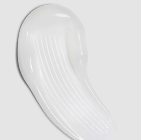 Milky white ENVIRON Sebu-Spot Blemish Gel texture sample spread on a light background.