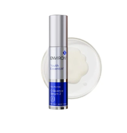 Premium silver pump bottle on a transparent creamy texture swatch.