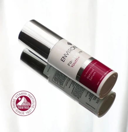 ENVIRON Tri-Retinoid Complex Retinol Serum Forte bottle beside the Swiss Vitamin Institute certificate logo.