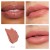 Bellini shade of Jane Iredale ColorLuxe lipstick in a warm apricot-peach nude.