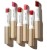 Jane Iredale ColorLuxe lipstick collection in elegant gold packaging with water droplets on the bullets.