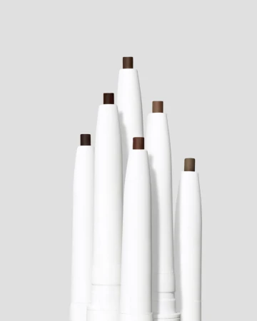 Set of Jane Iredale PureBrow Precision Pencils in different shades with triangular precision tips.