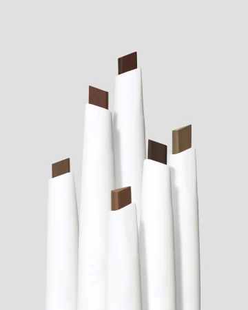 Set of six Jane Iredale PureBrow Shaping Pencil brow pencils in different shades. Angled triangular tips for precise shaping and filling of the brows.