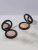 Open INIKA Organic Baked Illuminisor compacts showing STARLIGHT on the left and DEWDROP on the right.