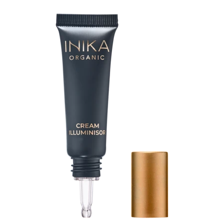 INIKA Organic Cream Illuminisor PINK PEARL tube with gold cap placed beside the fine applicator tip.