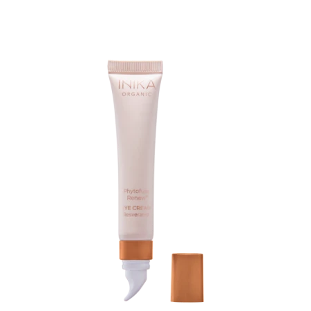 INIKA Organic Phytofuse Renew Eye Cream tube with sculpted cooling applicator in soft pink and copper packaging.