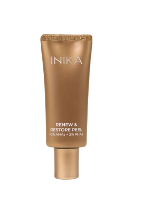 INIKA Organic Renew & Restore Peel in an elegant copper-gold tube with a matte finish.