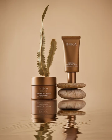 Two INIKA Organic skincare products shown together: Overnight Repair Treatment and Renew & Restore Peel.