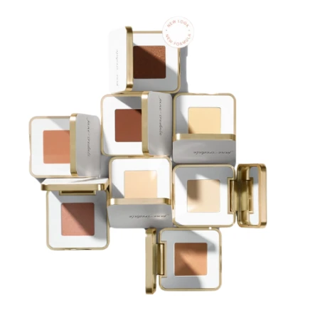 Eight Jane Iredale single eyeshadows in square white and gold compacts.