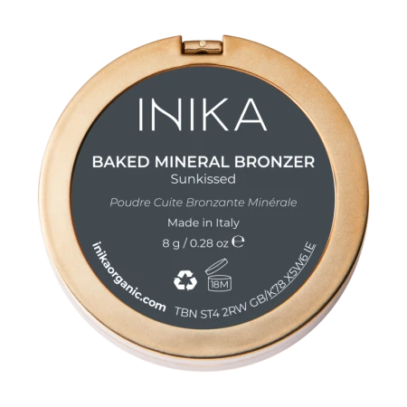 Bottom of INIKA Organic Baked Mineral Bronzer compact in shade Sunbeam, with elegant gold minimalist packaging.
