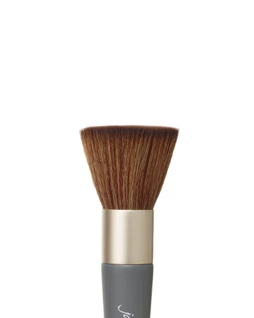 Close-up of the flat, dense synthetic bristles of Jane Iredale The Handi Brush.