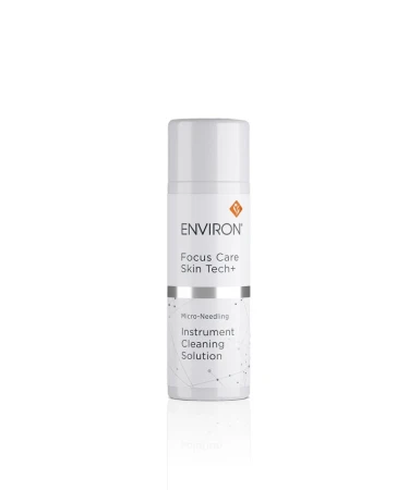 White bottle of ENVIRON Instrument Cleaning Solution with silver-white label.