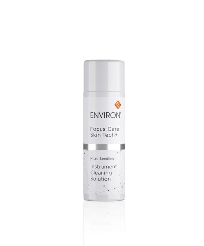 White bottle of ENVIRON Instrument Cleaning Solution with silver-white label.