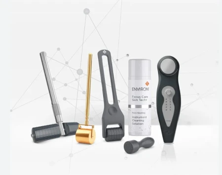 Set of Environ Skin Tech microneedling devices displayed together on a light background.