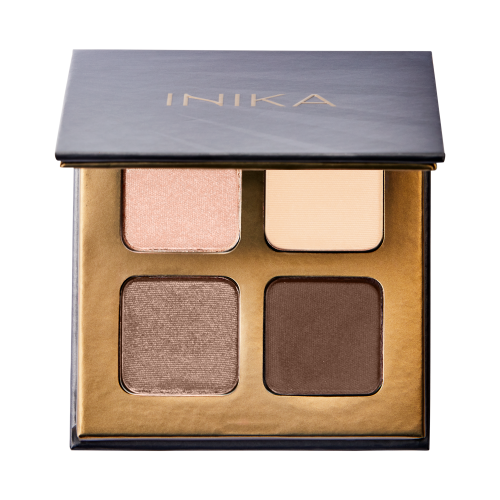 INIKA Organic Quad Eyeshadow Palette WIND in dark packaging with gold INIKA logo and four neutral shadows.