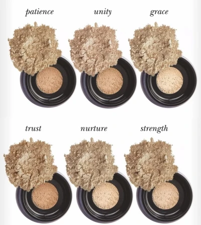 Six INIKA Organic Loose Mineral Foundation SPF25 shades shown in open jars with shade names below.
