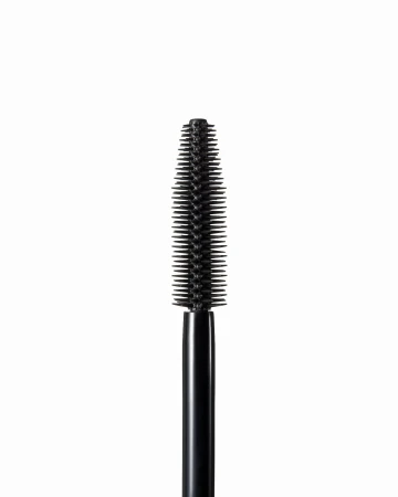 Close-up of the Jane Iredale Lash Fixation Tubing Mascara tapered brush with dense silicone bristles.