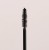 Close-up of the Jane Iredale Longest Lash Mascara spiral brush with tapered tip.