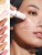 Model showing a radiant cheek glow with Jane Iredale Glow Time Blush shades beside her.