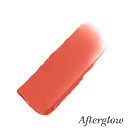 Afterglow shade swatch of Jane Iredale Glow Time Blush in a warm red-orange coral tone.