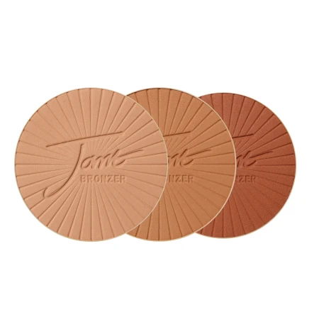 Three pressed Jane Iredale PureBronze Matte Bronzers in Light, Medium and Dark.